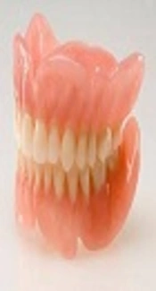Surface roughness of two Polyamide Material Types Used in the Manufacture of Denture Base Compared with a Type of Heat-cured Acrylic Resin